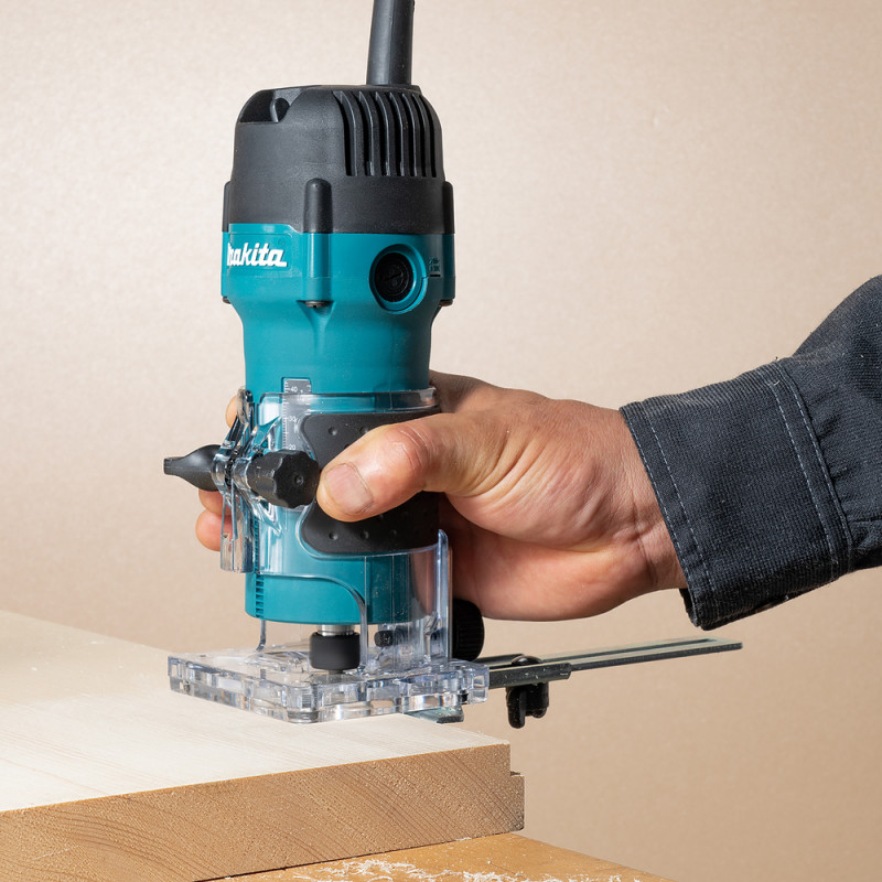 Affleureuse électrique Makita 560W pince 6mm légère et maniable